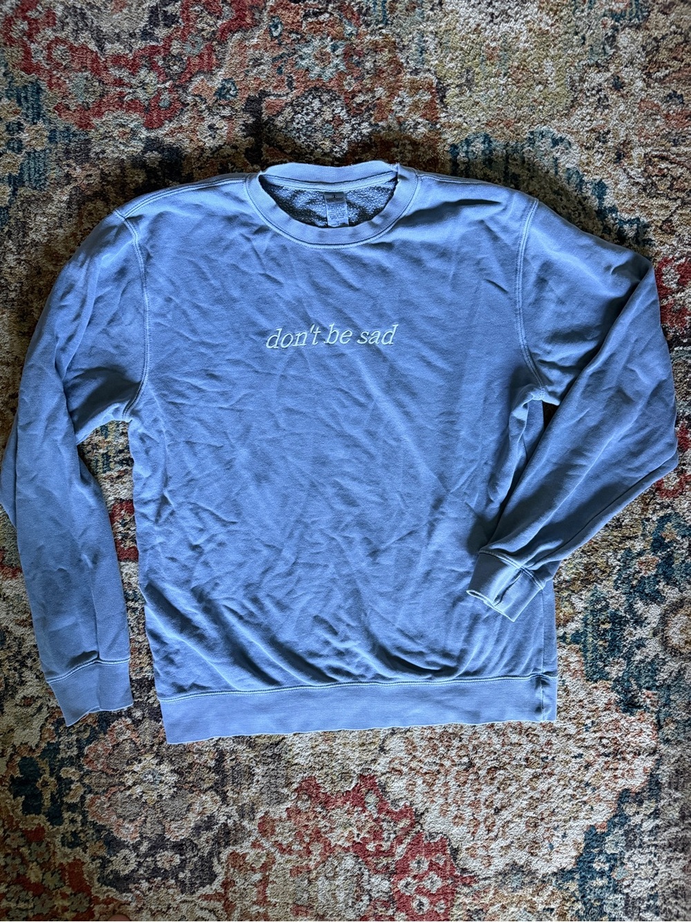 Light Blue Crewneck Sweatshirt with "don't be sad" Chest Print